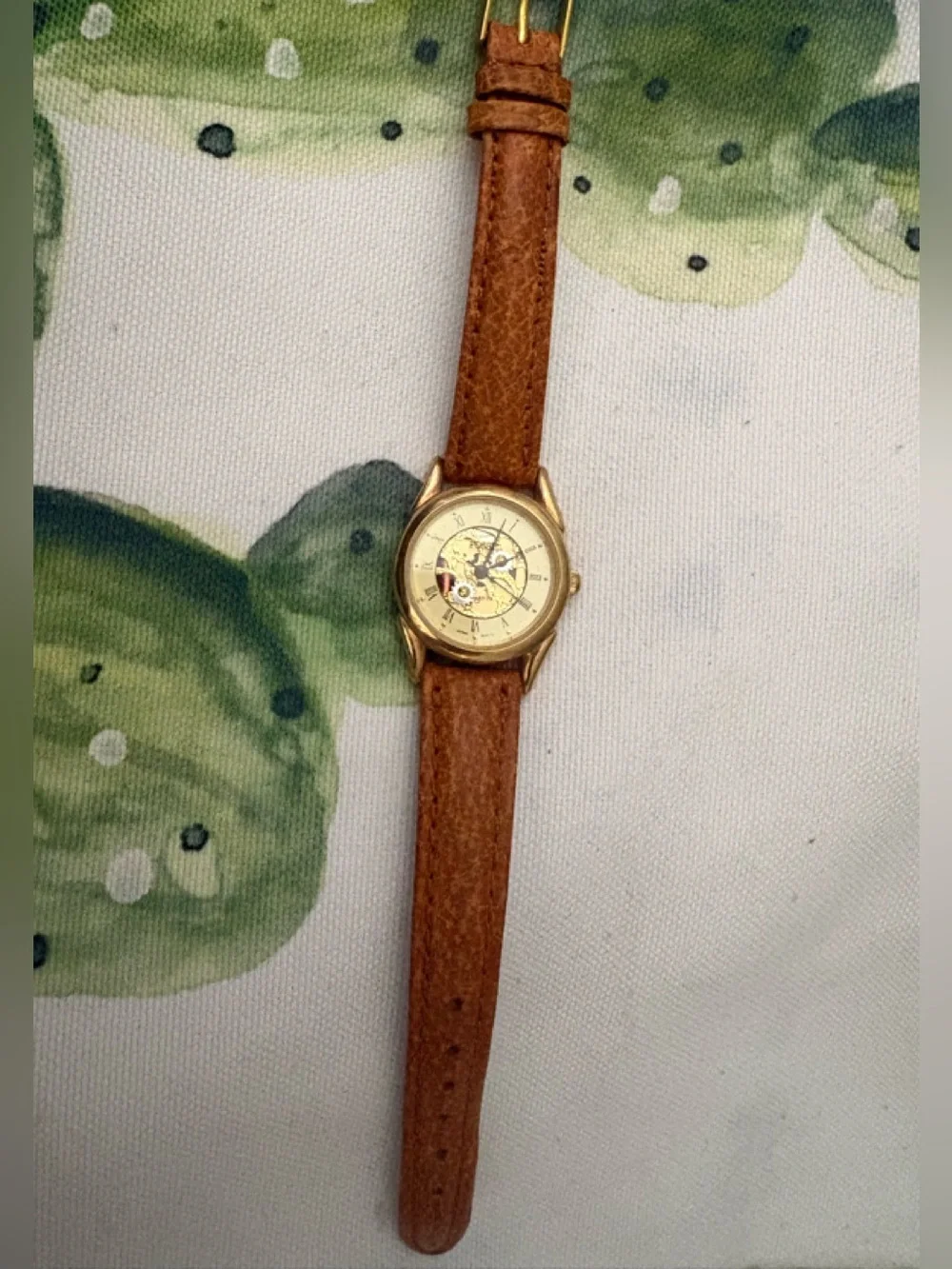 Gold-Tone Skeleton Dial Watch with Brown Leather Strap